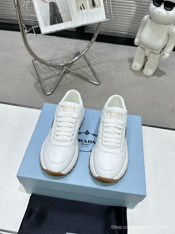 2025 Women Prada White Cow Leather Lambskin Sneakers KFY00310